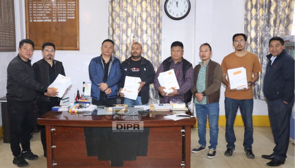 ADC & ERO, Dimapur, Zakabo V Rotokha, with AEO, Dimapur, Toshimongba Longchar, and other officials during the Final Publication of the Photo Electoral Roll at the ADC’s Office Chamber,  Dimapur. (DIPR Photo)